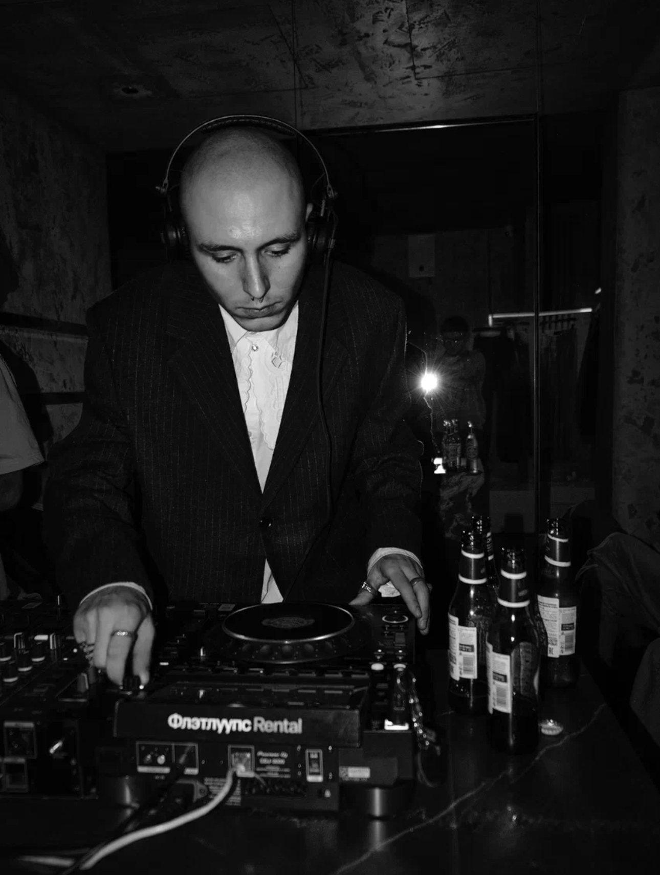 NOKIANGEL performing in a black and white club photograph